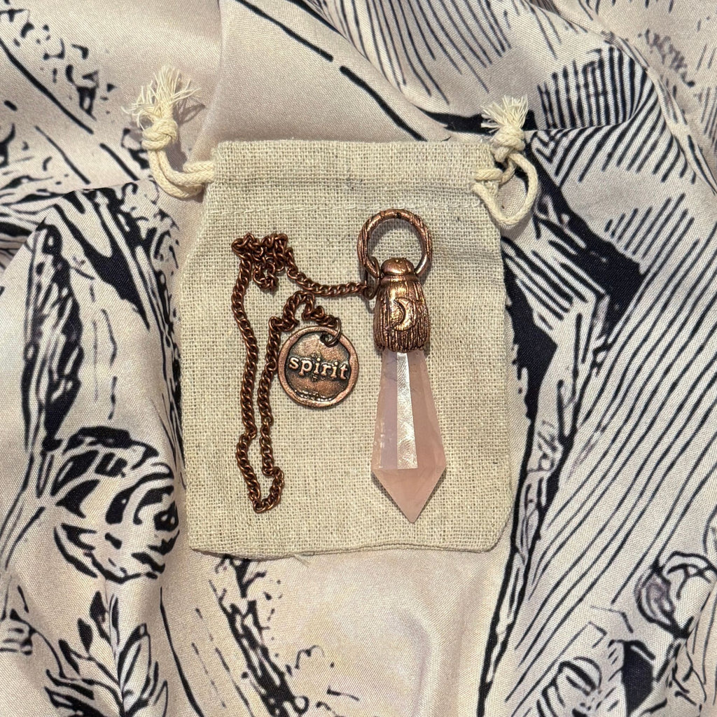 rose quartz crystal pendulum with moonstone jewel made by wild and the wolf